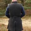 Ärmelloser Gambeson mit handgefertigen Details, schwarz